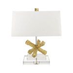 oryginalna, elegancka lampa stołowa z białym abażurem i podstawą złotą w kształcie rozgwiazdy