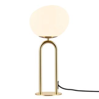 złota lampa stołowa ze szklanym kloszem