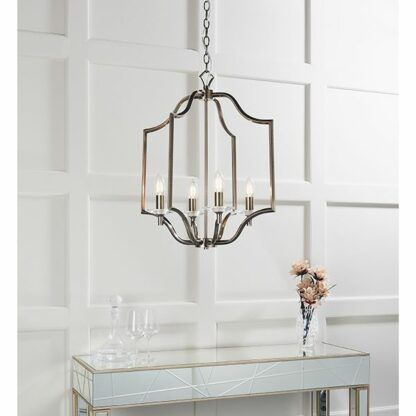 Lampa wisząca nad szklana komodą w stylu klasycznym