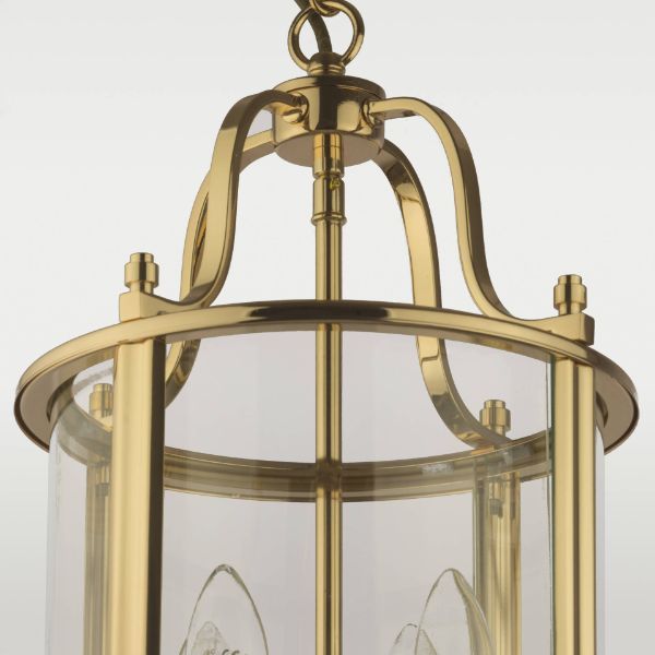 Lampa w złotej obramówce z transparentnymi ścianami