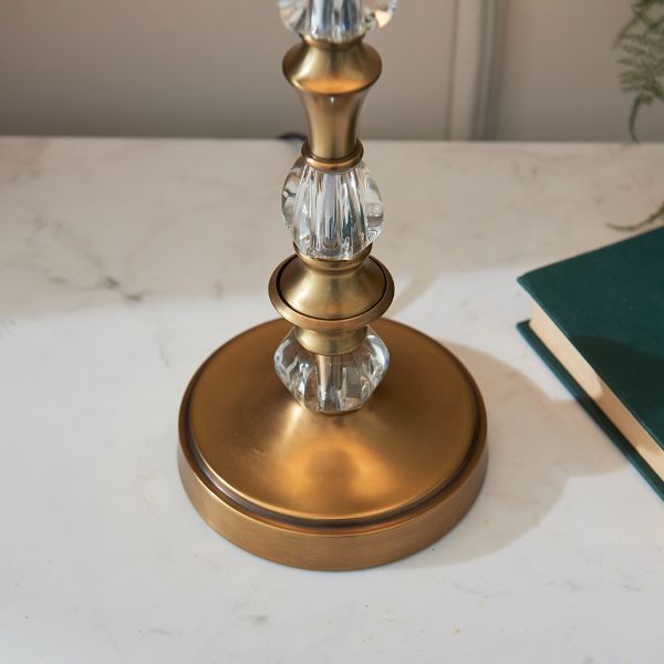 Złota podstawa lampy stołowej ze zdobieniami