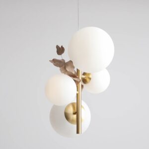 Pionowa lampa wisząca Bloom 4 - kule i mosiądz