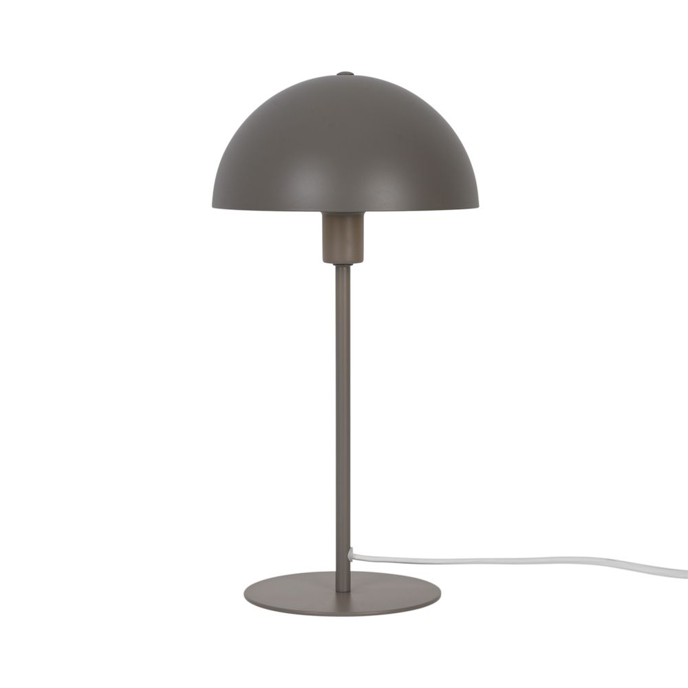 Minimalistyczna lampa stołowa na szklanym stoliku