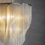 lampa wisząca kaskada łańcuszków elegancka