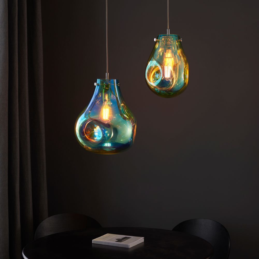 szklane nowoczesne lampy nad okrągły stół