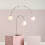 Beżowa lampa wisząca Una 2 kule na łuku