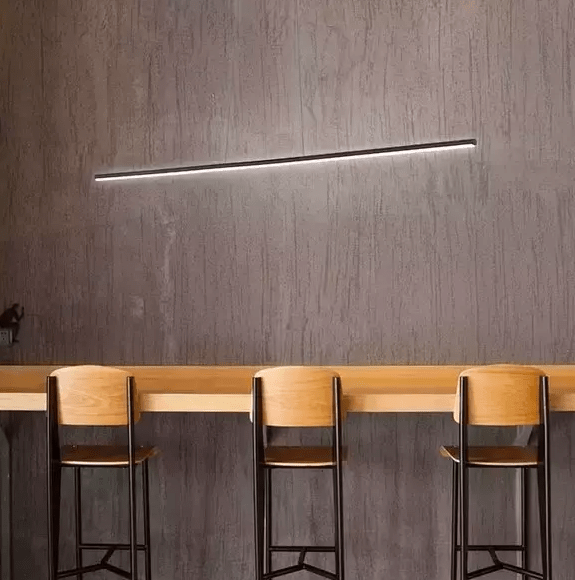 Lampa podłużna LED nad drewaniany stół - Linea