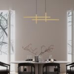 Złota geometryczna lampa wisząca do jadalni Shadowbeam