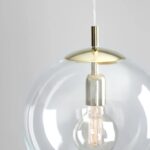 Złota lampa wisząca Globe - przezroczysta szkalna kula