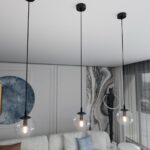Bezbarwna lampa wisząca Cosmo - salon