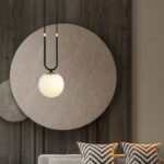 Czarno-złota lampa wisząca Glam - kula na łuku