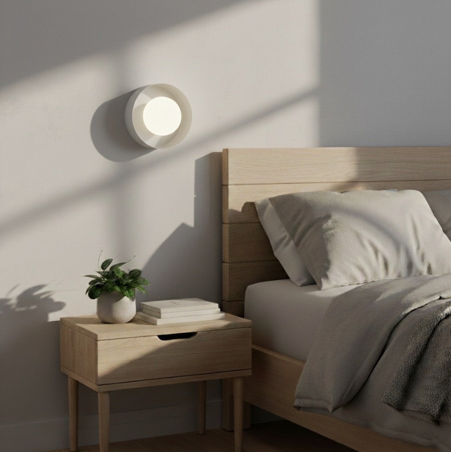 Biały okrągły kinkiet ścienny Lulu do sypialni - minimalistyczny