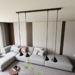 Czarna lampa wisząca na listwie Elit 4 do salonu - metalowe klosze stożki