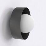 Okrągły kinkiet Lulu do sypialni - metal i szkło - czarno-biały