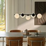 Podłużna lampa wisząca Lilly 5 - białe kule nad stół