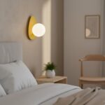 Pomarańczowy kinkiet ścienny Ovo - metalowy z białą kulą