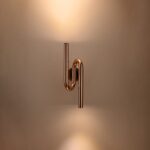 Miedziany kinkiet do eleganckiego salonu Myk LED - skręcona linia - Step into Design
