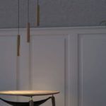 drewniana lampa wisząca w skandynawskim stylu nad stół