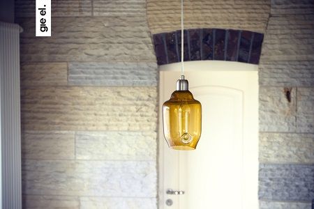 lampa wisząca z żółtego szkła w stylu nowoczesnym